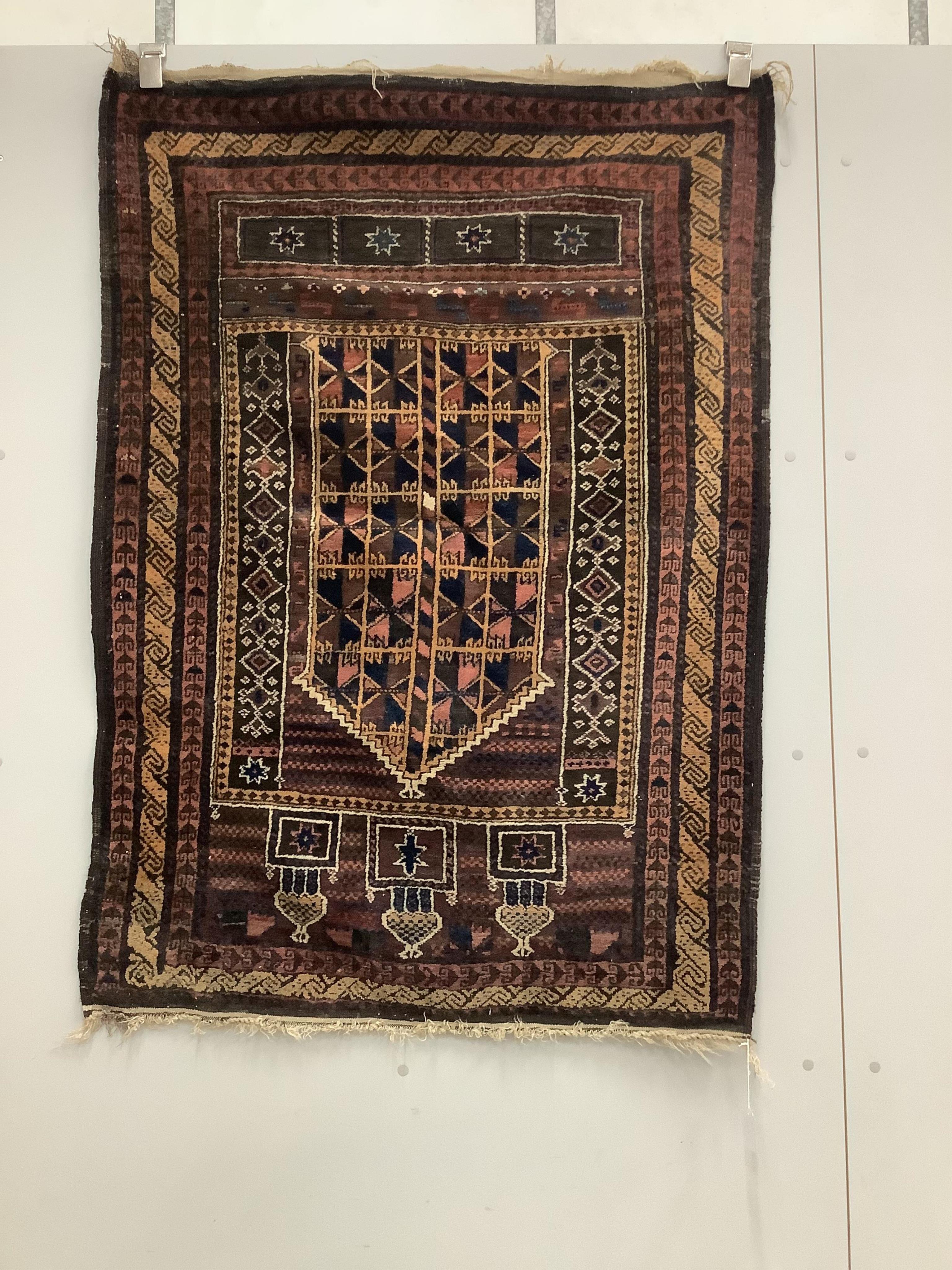 A Belouch prayer rug, 138 x 97cm. Condition - fair